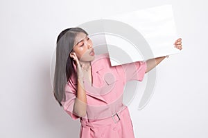 Young Asian woman  surprise with  white blank sign