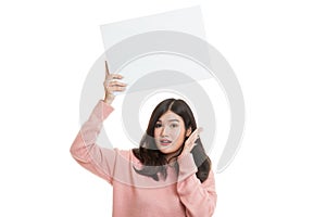 Young Asian woman surprise with white blank sign.