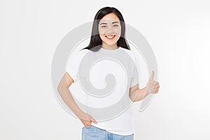 Young asian woman in template blank t shirt showing big thumb up isolated on white background. Happy and success concept.