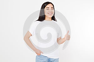 Young asian woman in template blank t shirt showing big thumb up isolated on white background. Happy and success concept.