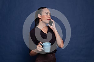 Young Asian woman with tin can phone