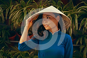 Young asian woman in traditional vietnamese dress ao dai