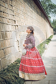 Young asian woman traveler in korean national dress