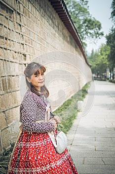 Young asian woman traveler in korean national dress