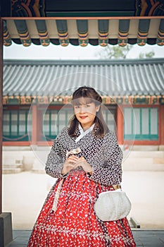 Young asian woman traveler in korean national dress