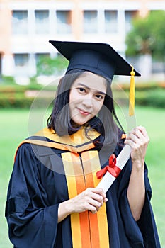 Young Asian woman university graduates celebrate with joyouse and happiness with friends after receiving university degree