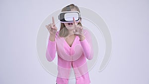 Young Asian woman using virtual reality headset