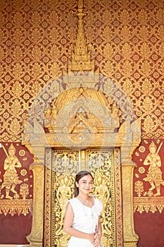 Young Asian Woman at Wat Sene Souk Haram ,Luang Prabang, LAOS