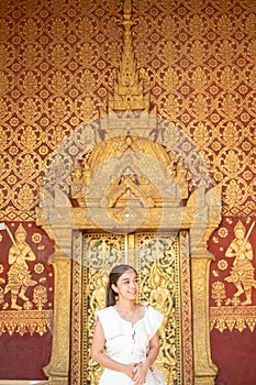 Young Asian Woman at Wat Sene Souk Haram ,Luang Prabang, LAOS