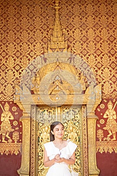 Young Asian Woman at Wat Sene Souk Haram ,Luang Prabang, LAOS