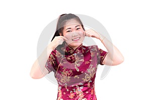Young asian woman wearing chinese dress traditional cheongsam wi
