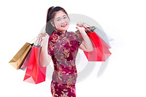 Young asian woman wearing chinese dress traditional cheongsam wi