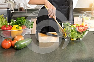 young asian woman work cooking in modern kitchen