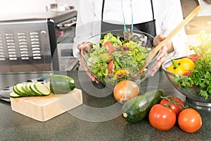 young asian woman work cooking