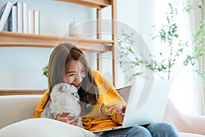 Young asian woman working at home