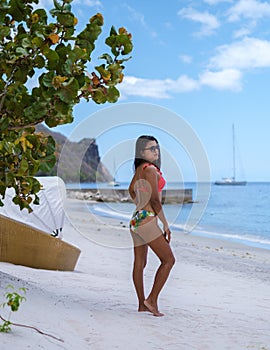 young Asian women on the beach at vacation Saint Lucia, luxury holiday Saint Lucia Caribbean