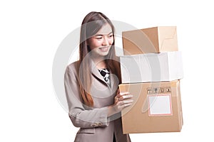 Young Asian working woman with 3 shipping boxes.