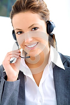 Young assistant operator with headset