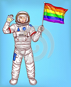 Young astronaut girl with rainbow flag