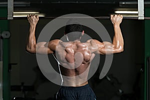 Young Athlete Doing Pull Ups