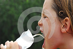 Young athlete hydrating