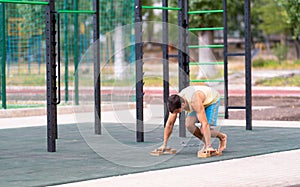 Young athlete preparing to use floor handles