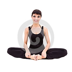 Young athlete woman doing stretching exercise