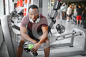 Young athletic African American man in the gym