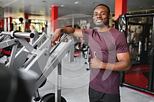 Young athletic African American man in the gym