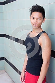 Young athletic asian swimmer