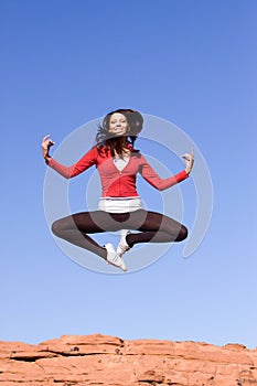 Young athletic woman jumping