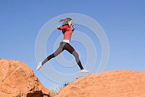 Young athletic woman running