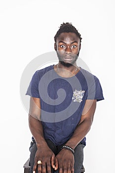 Young attractive african american man isolated thinking emotional on white close up, lifestyle people concept