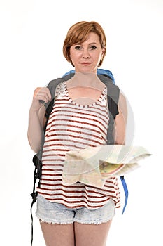 Young attractive American tourist woman with red hair holding city map carrying backpacker rucksack