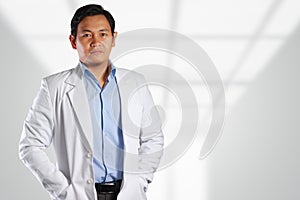 Young Attractive Asian Male Doctor Smiling