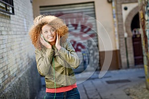 Young attractive black female in urban background