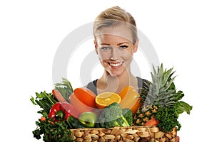 Young Attractive blond woman with fruits