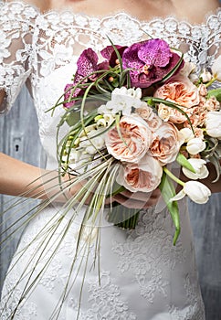 Young attractive bride with flowers