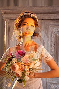 Young attractive bride with flowers