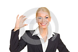 Young attractive business woman with card