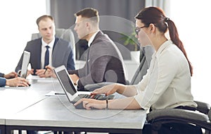 Young attractive business woman working in the office, developing her strategy