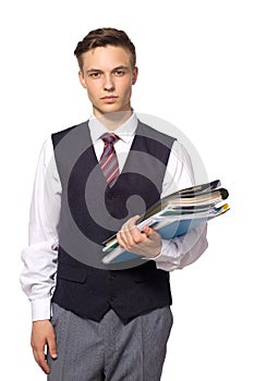 Young attractive businessman with files, folders and papers isolated on white