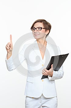 Young attractive businesswoman pressing the touchscreen button.