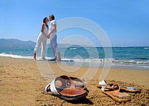 Young attractive couple at the beach