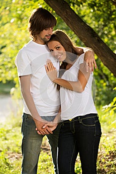 Young attractive couple together outdoors