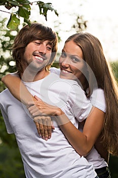 Young attractive couple together outdoors