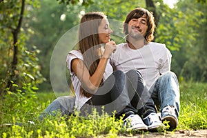 Young attractive couple together outdoors