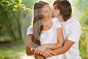 Young attractive couple together outdoors