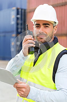 Young Attractive docker using tablet at work