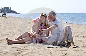 Young attractive family on vacation in Spain